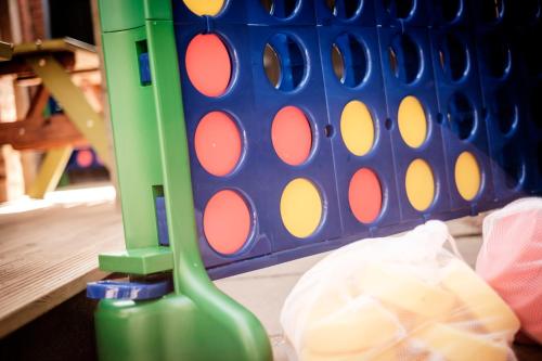 a close up of a play set with a racket at The Queen's Head in Kingston upon Thames