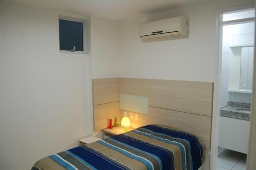 Легло или легла в стая в Apartamento Pé na Areia Porto das Dunas - Paraiso das Dunas