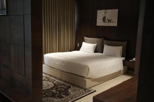 Jas Grand Innにあるベッド