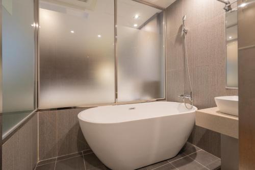 Bilik mandi di Nampo Button Hotel