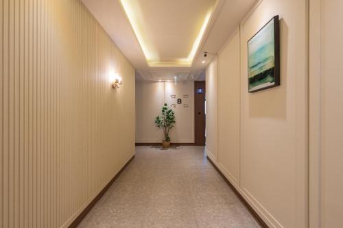 Televisyen dan/atau pusat hiburan di Nampo Button Hotel