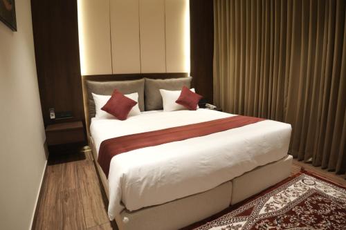 Jas Grand Innにあるベッド