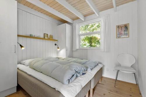 En eller flere senge i et værelse på 84214-Ebeltoft-Brigvej-33