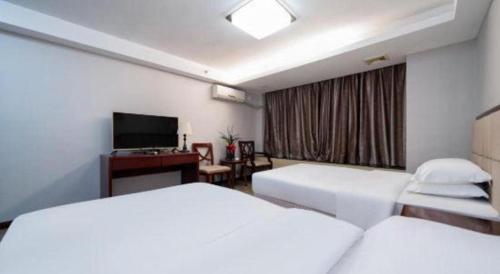 Postel nebo postele na pokoji v ubytování Bashan Hotel
