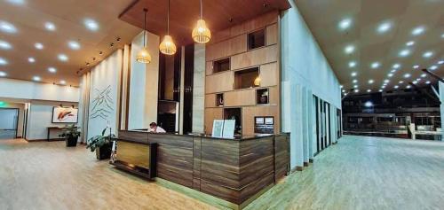 a large lobby with a counter in a building at Stena Stays in Kaybagal
