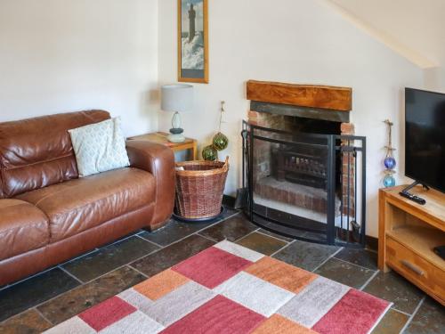 Posezení v ubytování Holly Cottage