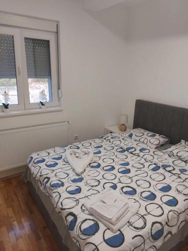 Postel nebo postele na pokoji v ubytování Apartman 028