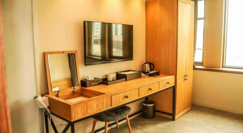 Příslušenství pro přípravu čaje a kávy v ubytování A-One Hotel
