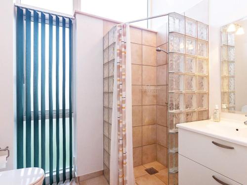 a bathroom with a shower and a toilet at Scenic Golf Retreat-By Traum in Bogense
