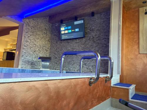 Camellia apartmentsにあるテレビまたはエンターテインメントセンター
