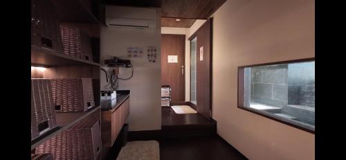 Una cocina o zona de cocina en Hokkawa Onsen Hotel