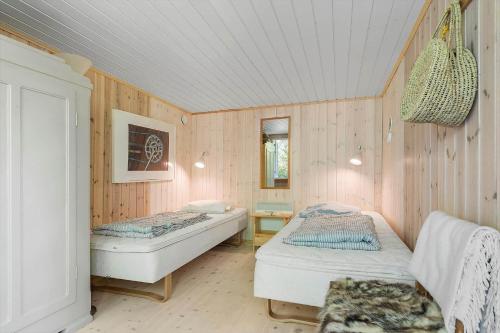 Ένα ή περισσότερα κρεβάτια σε δωμάτιο στο 1555-Dronningmolle-Slaenvangen-34