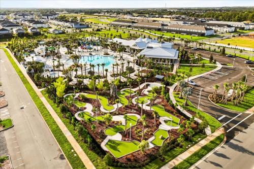 an aerial view of a resort with a pool at 10 Bedrooms 8 Bathrooms Windsor Cay 16207Cc in Clermont