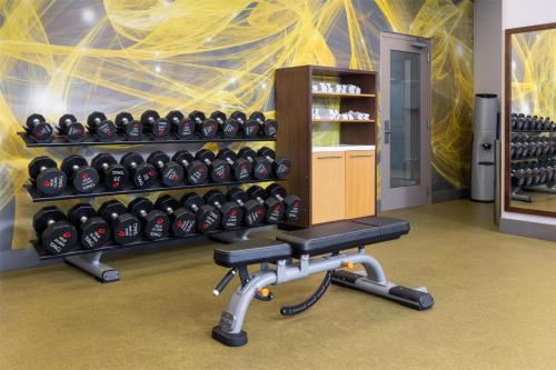 a gym with a rack of bottles of wine at Homewood Suites by Hilton Baltimore - Arundel Mills in Hanover
