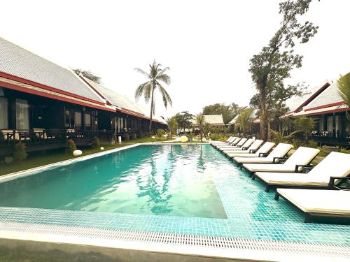 Πισίνα στο ή κοντά στο Mimosa Luangprabang Garden