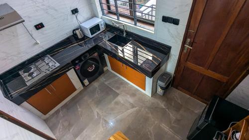 Kuchyň nebo kuchyňský kout v ubytování Gemson Apartment