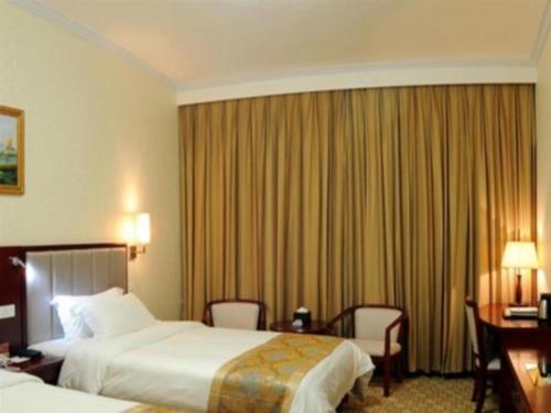 Cama o camas de una habitación en Nanning Yongzhou Hotel