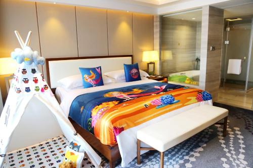 Ένα ή περισσότερα κρεβάτια σε δωμάτιο στο Intercontinental Jinan City Center by IHG