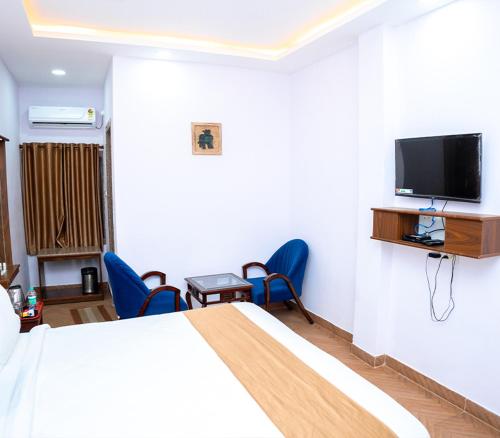 Μια τηλεόραση ή/και κέντρο ψυχαγωγίας στο Utsav Hotels and Banquets Bolpur