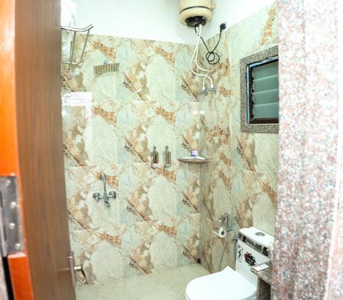 Ένα μπάνιο στο Utsav Hotels and Banquets Bolpur