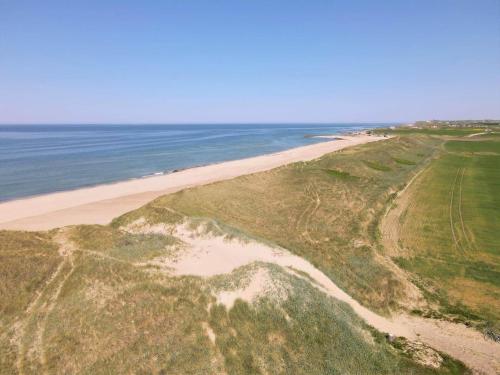 an aerial view of a beach and the ocean at 526-Lemvig-Rubyvej-21 in Lemvig