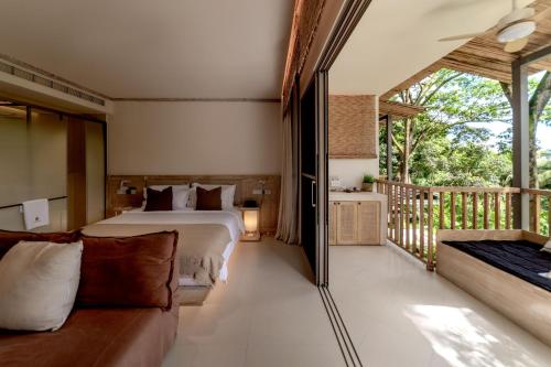 Katil atau katil-katil dalam bilik di Wan'an Tinglan Wild Luxury Resort Hotel