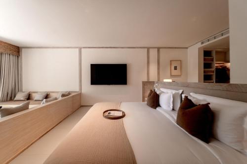 Televisyen dan/atau pusat hiburan di Wan'an Tinglan Wild Luxury Resort Hotel