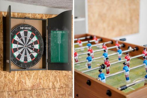 a dart board and a bunch of toy figures at 723-Thyboron-Jagtvej-4 in Thyborøn