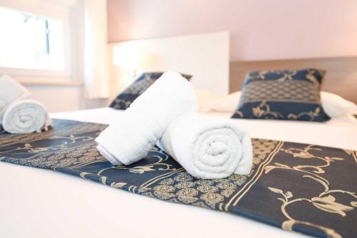 Katil atau katil-katil dalam bilik di Residence Fontanelle