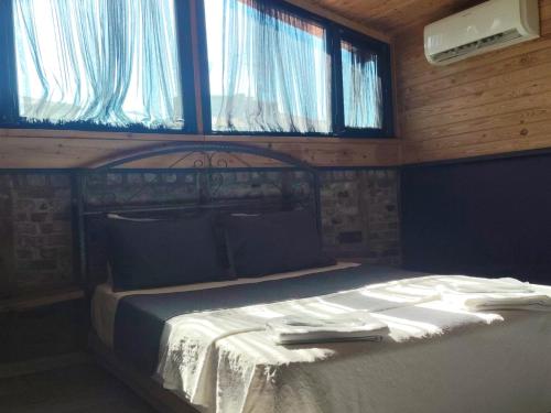 Postel nebo postele na pokoji v ubytování ANKA RESİDENCE KIZıLAY