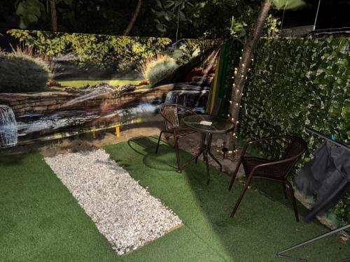Jardí fora de Apart Arm