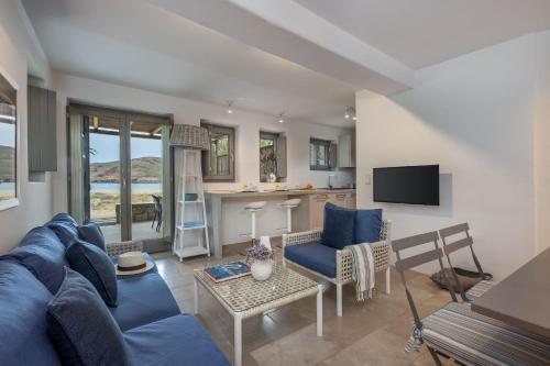 Телевизор и/или развлекательный центр в Ammoa Beach Residences
