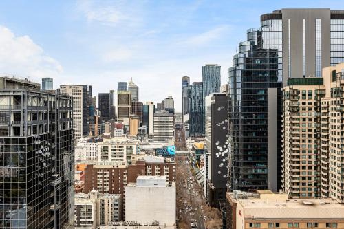 a view of a city with many tall buildings at Nolo Apartments Lonsdale St in Melbourne