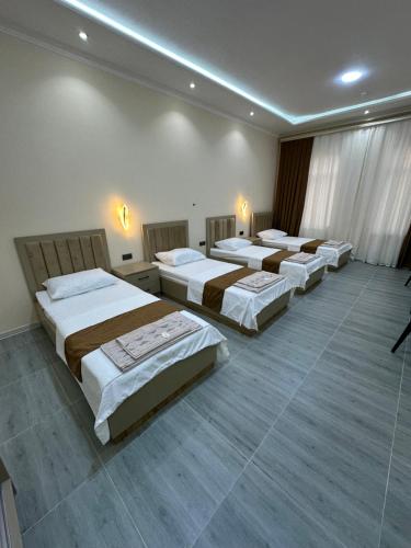 Кровать или кровати в номере Hotel Moon
