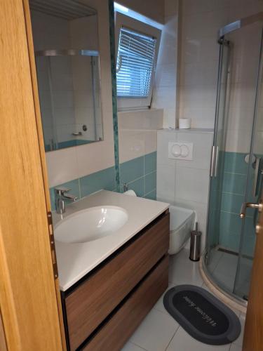 Koupelna v ubytování Apartments Grabovica