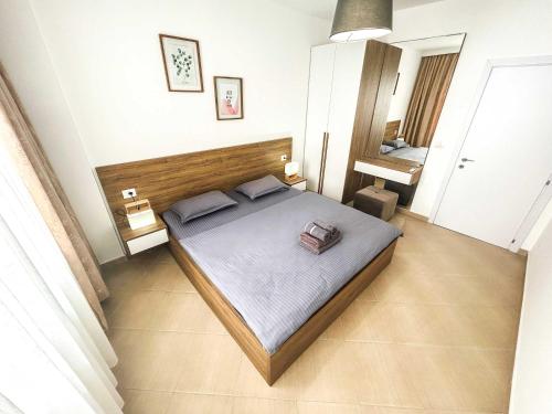 a bedroom with a large bed in a room at Marine Center in Golem