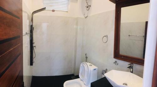 Koupelna v ubytování Sinharaja Tea Garden Hotel