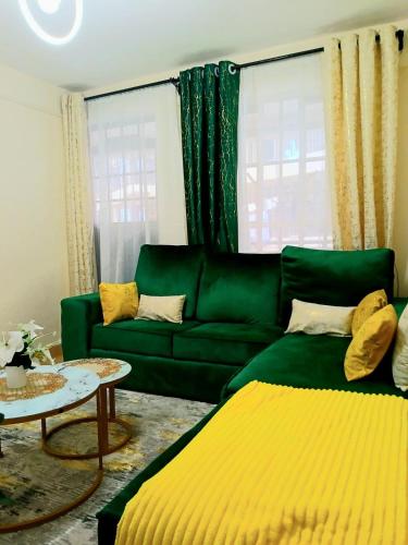 Χώρος καθιστικού στο Cosy Homes II