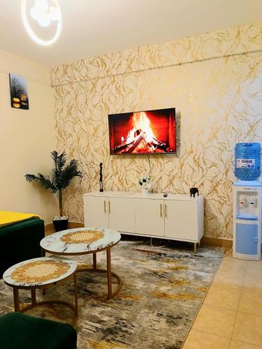 Μια τηλεόραση ή/και κέντρο ψυχαγωγίας στο Cosy Homes II