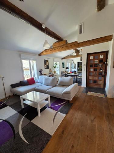 Posezení v ubytování Appartement de luxe à 100m des Arènes