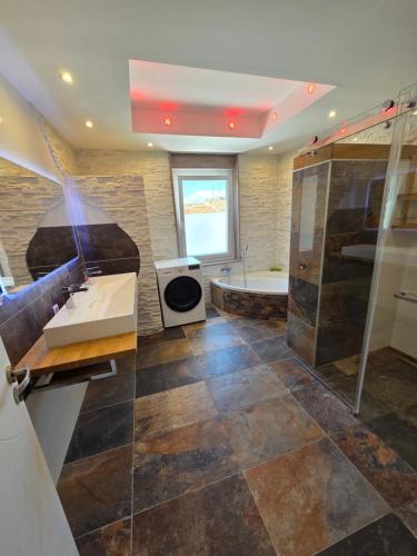 Koupelna v ubytování Appartement de luxe à 100m des Arènes