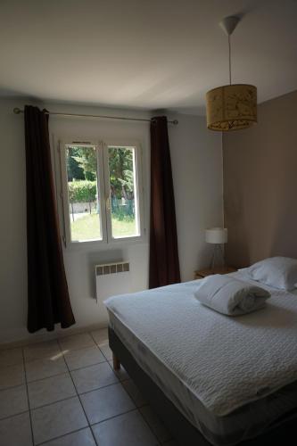 Ένα ή περισσότερα κρεβάτια σε δωμάτιο στο Pleasant house close to Anduze