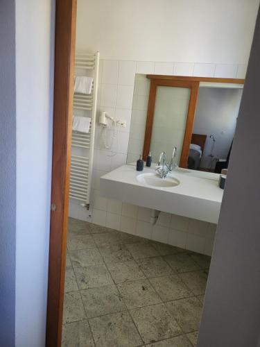 Koupelna v ubytování Hotel Wiener Kindl