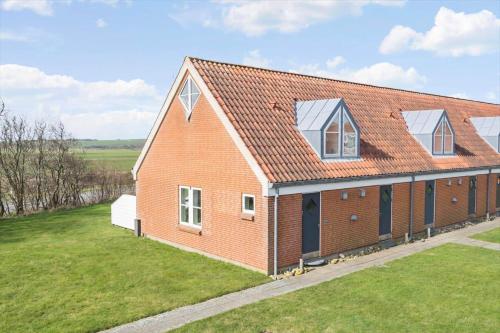 an image of a red brick house at G426-Lemvig-Sogardevejen-8-A in Lemvig