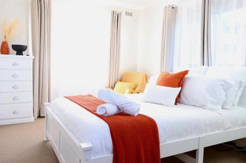 Ένα ή περισσότερα κρεβάτια σε δωμάτιο στο Willow's Beach House