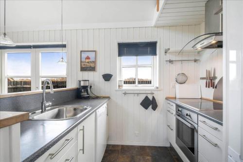 a kitchen with a sink and a counter top at 715-Thyboron-Limfjordsvej-17-a in Thyborøn