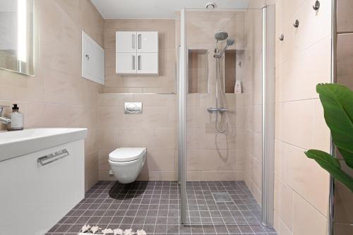 Et badeværelse på Northstay - Tromsø City Suite