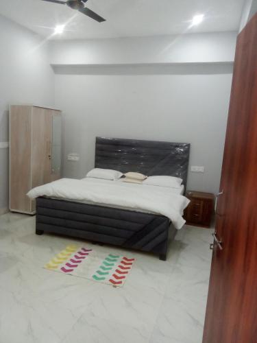 Ένα ή περισσότερα κρεβάτια σε δωμάτιο στο CITY CHARM Home Stay