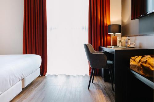 Postel nebo postele na pokoji v ubytování Hotel Kramer