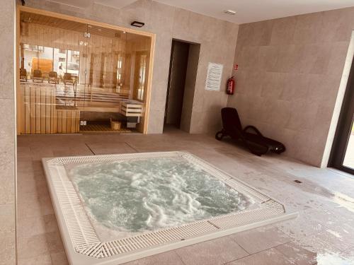 a large tub in the middle of a room at Apartament GABA-NIECHORZE przy plaży, kryty basen in Niechorze